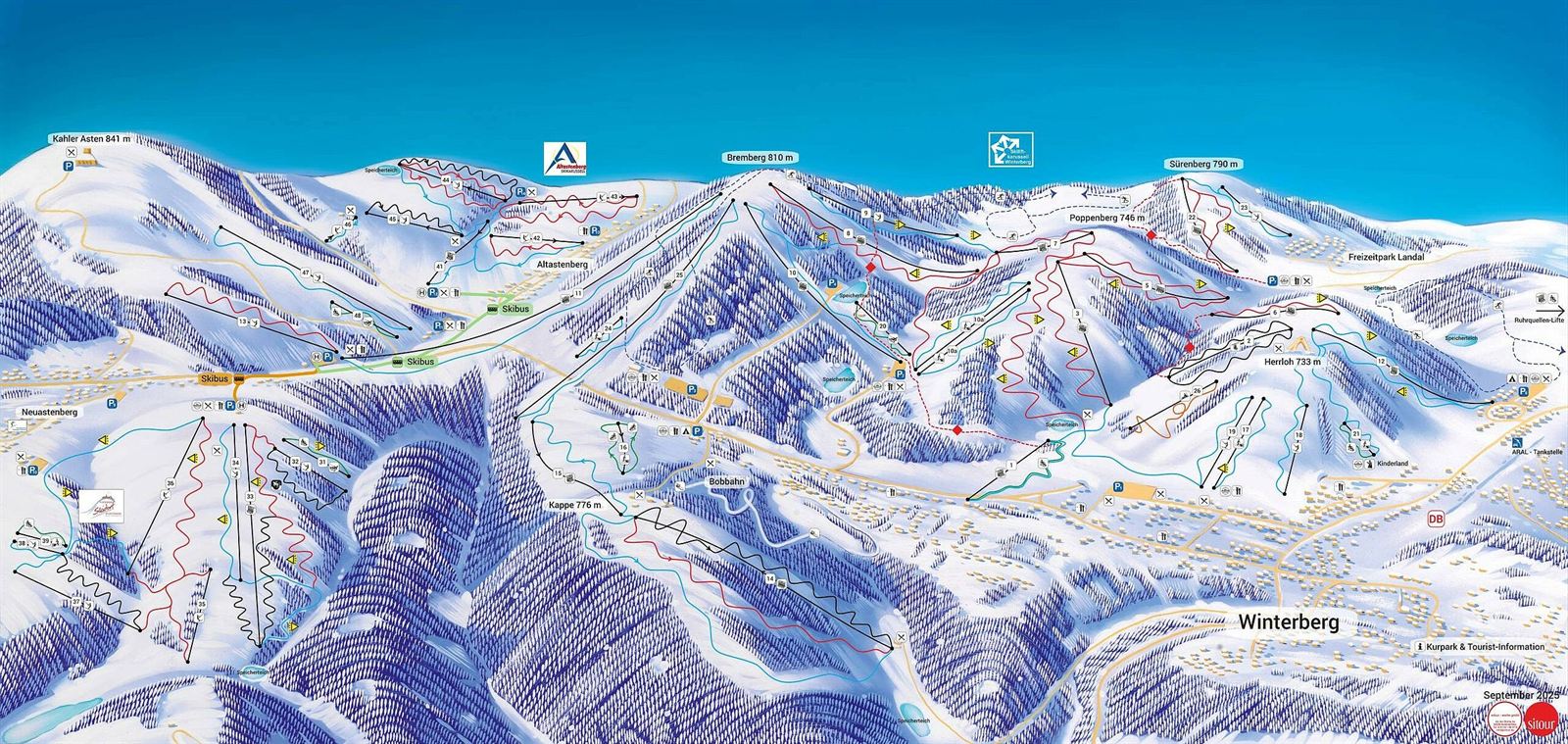 Skifahrer auf einer verschneiten Piste bei Winterberg
